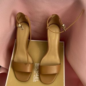 Tan leather wedge heel sandals by Michael Kors, brand new.